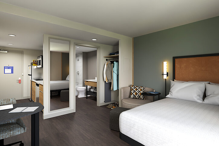 LivSmart Studios wird die neue Hilton-Marke heißen. Jede Einheit wartet, wie hier im Queen Guest Room, mit einer Küche samt Geschirrspüler sowie mit beweglichen Möbeln auf. © 2024 Hilton